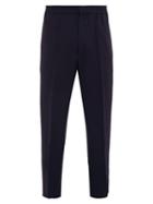 Matchesfashion.com Alexander Mcqueen - Piped Tapered Leg Crepe Trousers - Mens - Navy