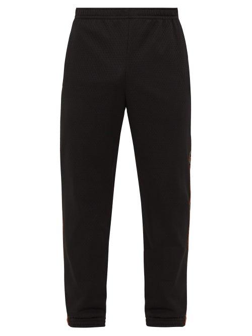 Matchesfashion.com Gucci - Logo-embroidered Swiss-dot Jersey Track Pants - Mens - Black