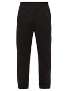 Matchesfashion.com Gucci - Logo-embroidered Swiss-dot Jersey Track Pants - Mens - Black