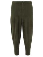 Homme Pliss Issey Miyake - Technical-pleated Tapered-leg Trousers - Mens - Green