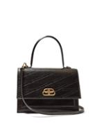 Matchesfashion.com Balenciaga - Sharp Xs Logo Embossed Leather Bag - Womens - Black