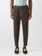 Homme Pliss Issey Miyake - Technical Pleated Tapered-leg Trousers - Mens - Brown