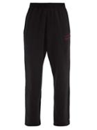 Matchesfashion.com Martine Rose - Logo-print Cotton-jersey Wide-leg Track Pants - Mens - Black