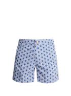 Matchesfashion.com Retromarine - Spider Star Print Tailored Swim Shorts - Mens - Blue