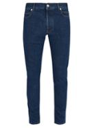 Matchesfashion.com Balmain - Logo Embossed Slim Leg Jeans - Mens - Blue