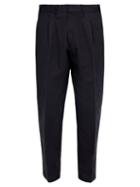 Matchesfashion.com The Gigi - Pleated Front Tapered Leg Cotton Trousers - Mens - Navy