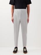 Homme Pliss Issey Miyake - Technical-pleated Tapered-leg Trousers - Mens - Grey