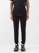 Balmain - Ribbed Organic Cotton-jersey Track Pants - Mens - Black Ivory