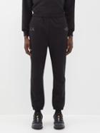 The North Face Xx Kaws - Logo Embroidered Cotton-blend Sweatpants - Mens - Black