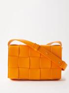 Bottega Veneta - Cassette Intrecciato-leather Cross-body Bag - Womens - Orange