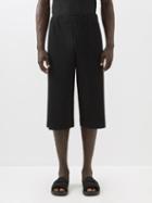 Homme Pliss Issey Miyake - Cropped Technical-pleated Trousers - Mens - Black