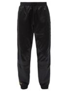Matchesfashion.com Fendi - Logo-embroidered Paneled-shell Track Pants - Mens - Black