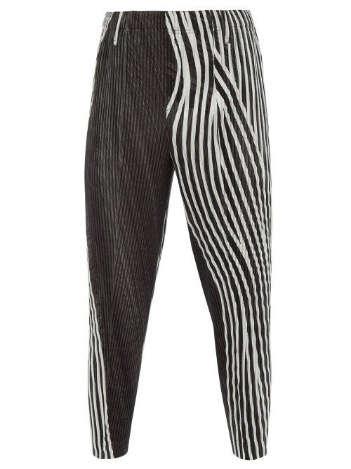 Homme Pliss Issey Miyake - Striped Technical-pleated Knit Trousers - Mens - Black