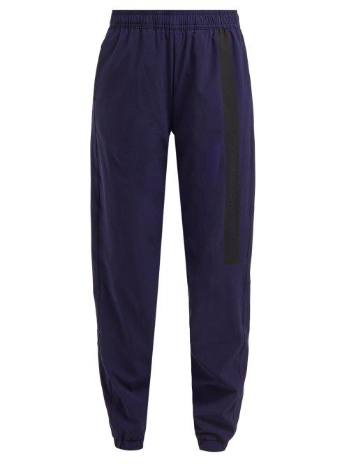 Matchesfashion.com Calvin Klein Performance - Side Stripe Shell Track Pants - Womens - Navy Multi