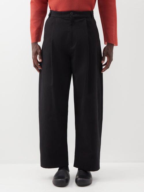Studio Nicholson - Pleated Cotton-twill Trousers - Mens - Black
