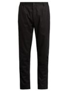 Études Archives Mid-rise Tapered-leg Wool-blend Trousers