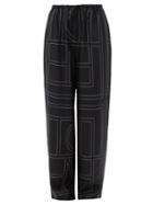 Matchesfashion.com Totme - Vizelle Logo-embroidered Silk Wide-leg Trousers - Womens - Black Multi