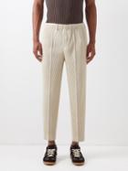 Homme Pliss Issey Miyake - Technical-pleated Tapered-leg Trousers - Mens - Beige