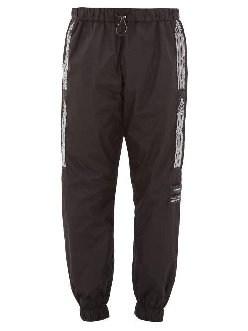Matchesfashion.com Marcelo Burlon - Logo-jacquard Stripe Shell Track Pants - Mens - Black White