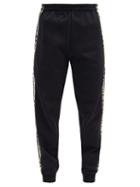 Matchesfashion.com Vetements - Logo-striped Cotton-blend Jersey Track Pants - Mens - Black