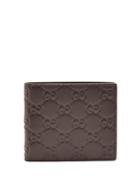 Matchesfashion.com Gucci - Gg Debossed Bi Fold Leather Wallet - Mens - Brown