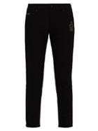 Matchesfashion.com Dolce & Gabbana - Sacred Heart Crest Embroidered Skinny Fit Jeans - Mens - Black