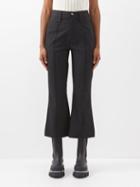 Ganni - High-rise Pinstriped Flared Trousers - Womens - Black