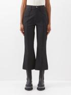 Ganni - High-rise Pinstriped Flared Trousers - Womens - Black