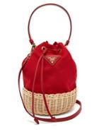 Matchesfashion.com Prada - Canvas And Woven Straw Bucket Bag - Womens - Red