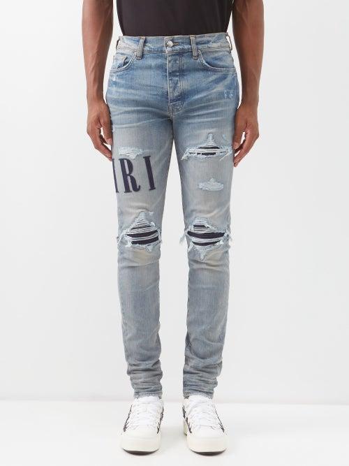 Amiri - Logo-appliqu Distressed Slim-leg Jeans - Mens - Blue