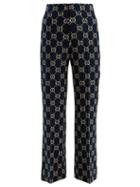 Matchesfashion.com Gucci - Gg Logo Jacquard High Rise Jersey Trousers - Womens - Blue Multi