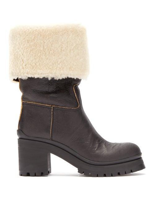 Matchesfashion.com Miu Miu - Leather And Shearling Boots - Womens - Black Cream