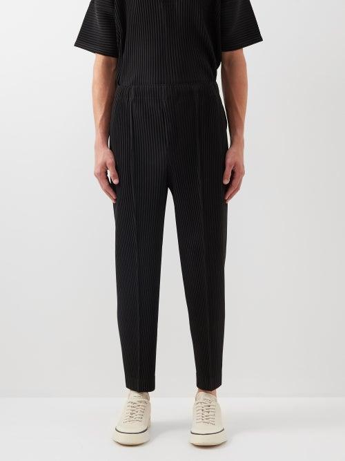 Homme Pliss Issey Miyake - Technical Pleated Tapered-leg Trousers - Mens - Black