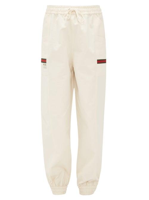 Matchesfashion.com Gucci - Web-striped Cotton-canvas Track Pants - Womens - Ivory Multi