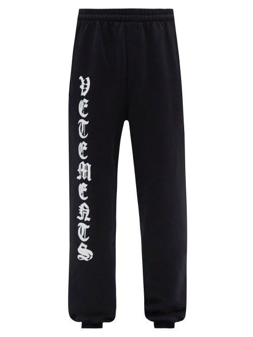Mens Rtw Vetements - Anarchy-print Cotton-jersey Track Pants - Mens - Black