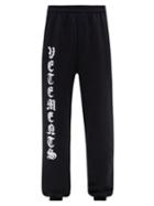 Mens Rtw Vetements - Anarchy-print Cotton-jersey Track Pants - Mens - Black