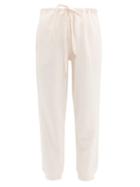Matchesfashion.com The Upside - Distressed Cuff Cotton Jersey Track Pants - Womens - Pink
