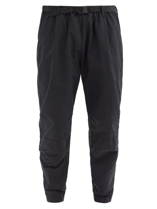 Matchesfashion.com Nemen - Rise Zip-cuff Garment-dyed Shell Track Pants - Mens - Black