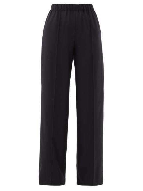 Matchesfashion.com Raey - Pintucked Elasticated-waist Wool Trousers - Womens - Navy