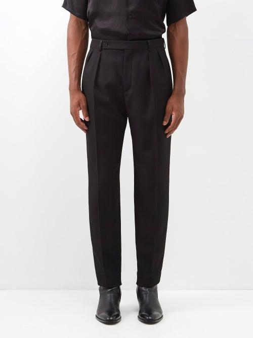 Saint Laurent - Pleated Wool-twill Carrot-leg Trousers - Mens - Black