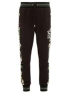 Matchesfashion.com Dolce & Gabbana - Orchid Print Cotton Jersey Track Pants - Mens - Black Multi