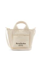 Matchesfashion.com Acne Studios - Aleah Logo-print Cotton-canvas Cross-body Bag - Womens - Beige