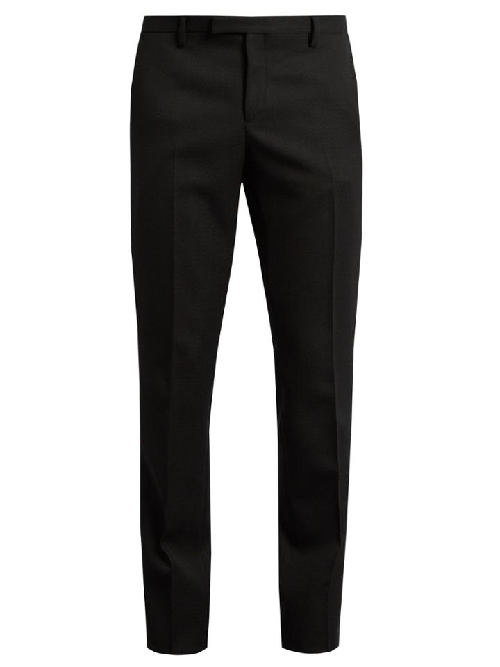 Saint Laurent Distressed Stud-trimmed Skinny Jeans