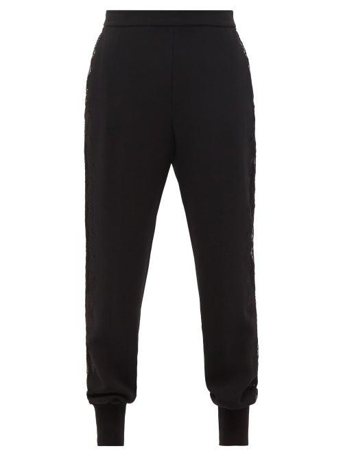 Matchesfashion.com Stella Mccartney - Julia Lace-panel Elasticated-cuff Cady Trousers - Womens - Black
