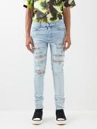 Amiri - Thrasher Distressed Skinny Jeans - Mens - Light Indigo
