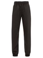 Matchesfashion.com Ganni - Tapered-leg Wool-twill Tailored Trousers - Womens - Dark Grey