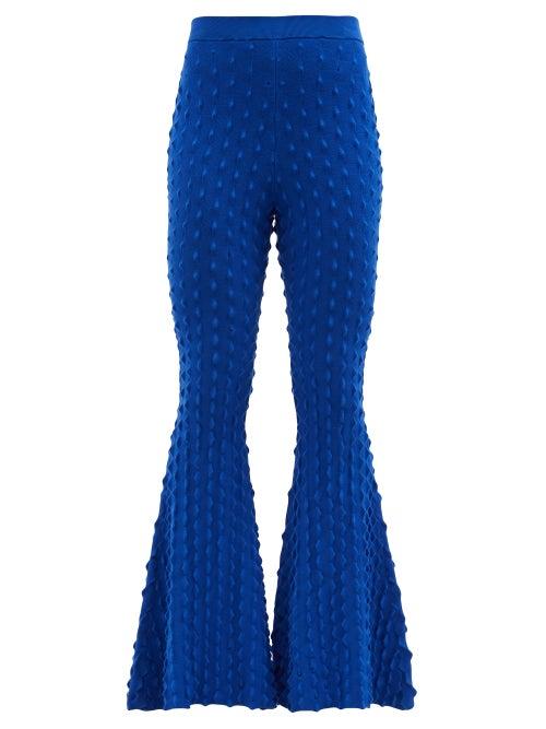 Stella Mccartney - High-rise Spiked-jersey Flared-leg Trousers - Womens - Blue