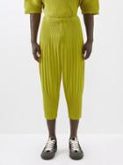Homme Pliss Issey Miyake - Cropped Technical-pleated Trousers - Mens - Light Green