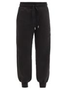Matchesfashion.com Adidas By Stella Mccartney - Logo-print Cuffed Organic-cotton Blend Track Pants - Womens - Black