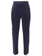 Matchesfashion.com Pleats Please Issey Miyake - Monthly Colours Tech-pleated Tapered Trousers - Womens - Navy